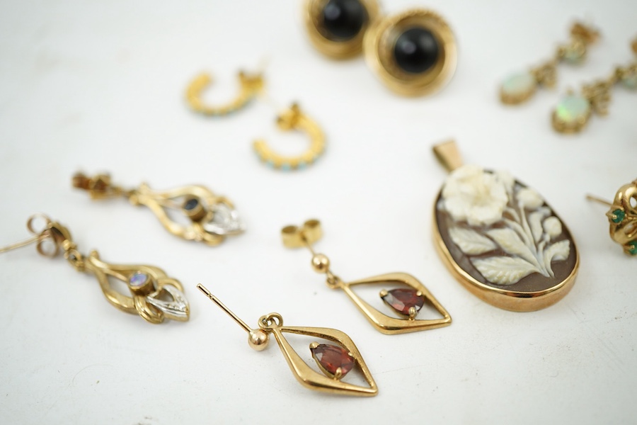 Eight pairs of earrings and pendant, comprising: a pair of onyx studs; a pair of emerald studs; a pair of sapphire and diamond drop earrings; a pair of opal drop earrings; a pair of garnet drop earrings; and a shell pend